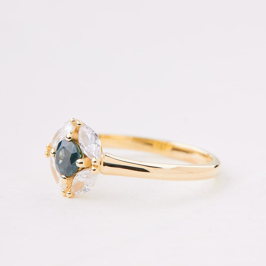 Magritte Ring set with turquoise sapphire and lab diamonds