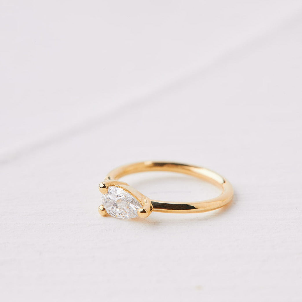 Drop-shaped Hoop Earring with a teardrop stone
