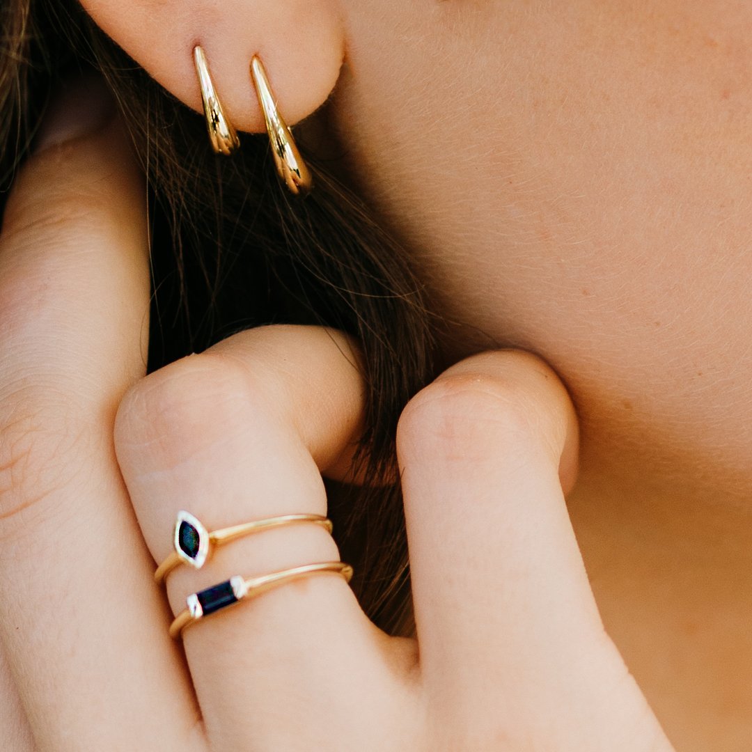 Gold pear hoop earring