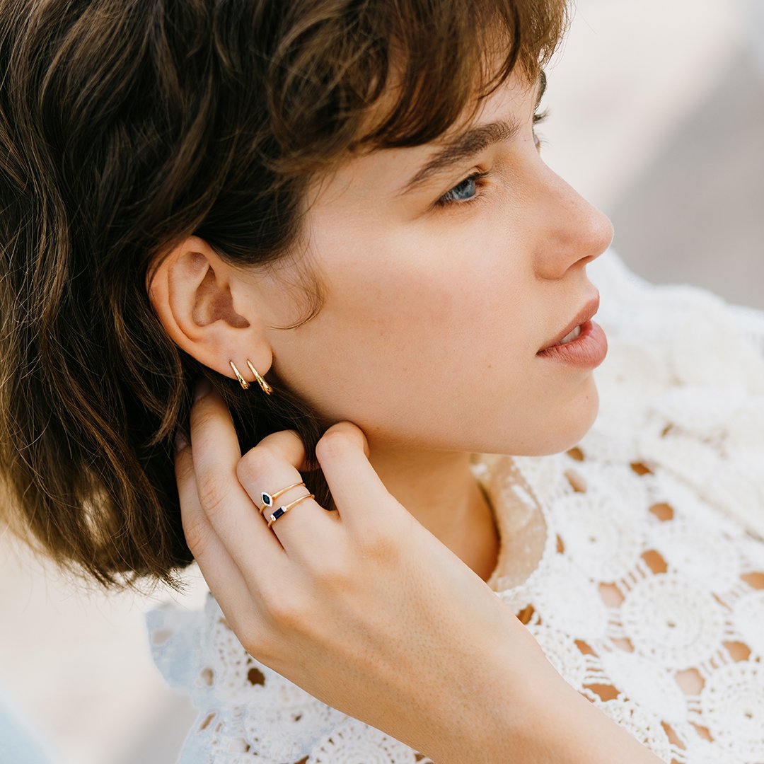 Gold pear hoop earring