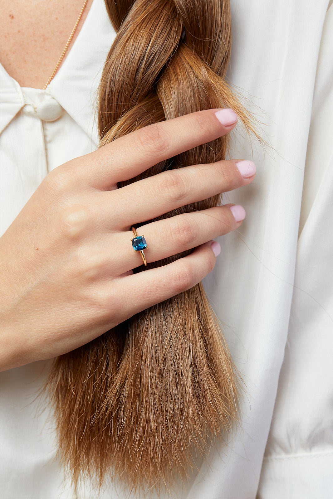With a sapphire stone and a gold hyacinth ring