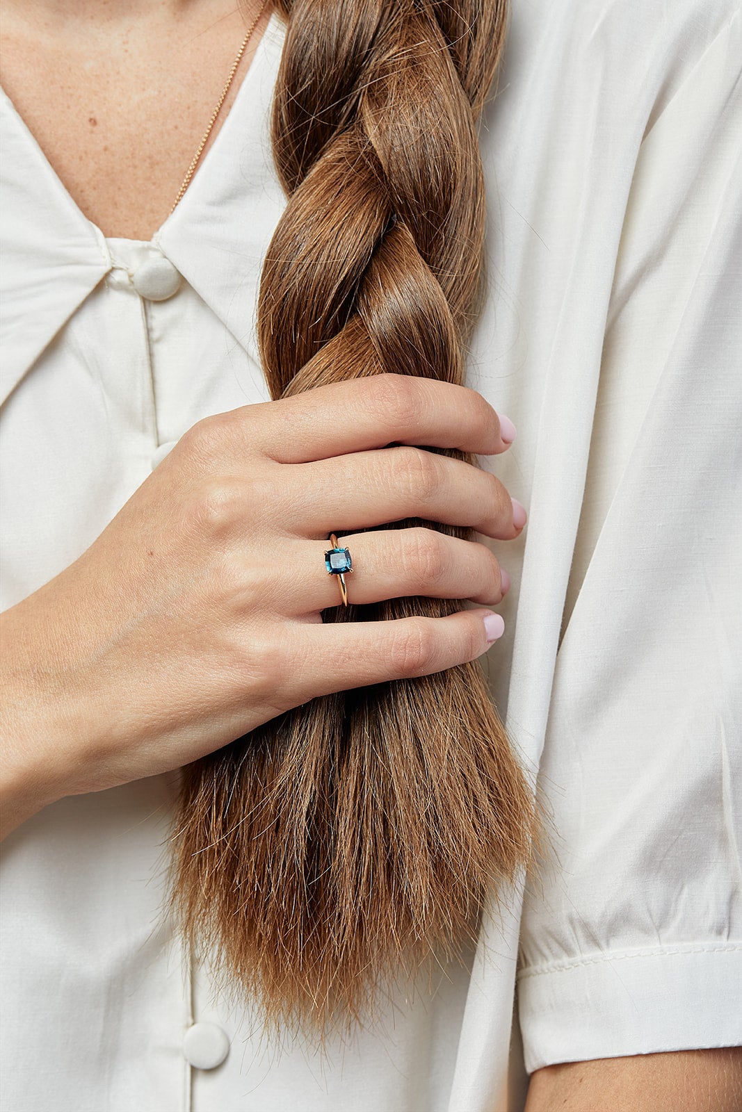 With a sapphire stone and a gold hyacinth ring