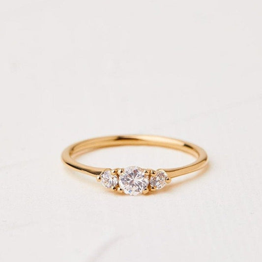Anemone ring with a central diamond of 0.35ct