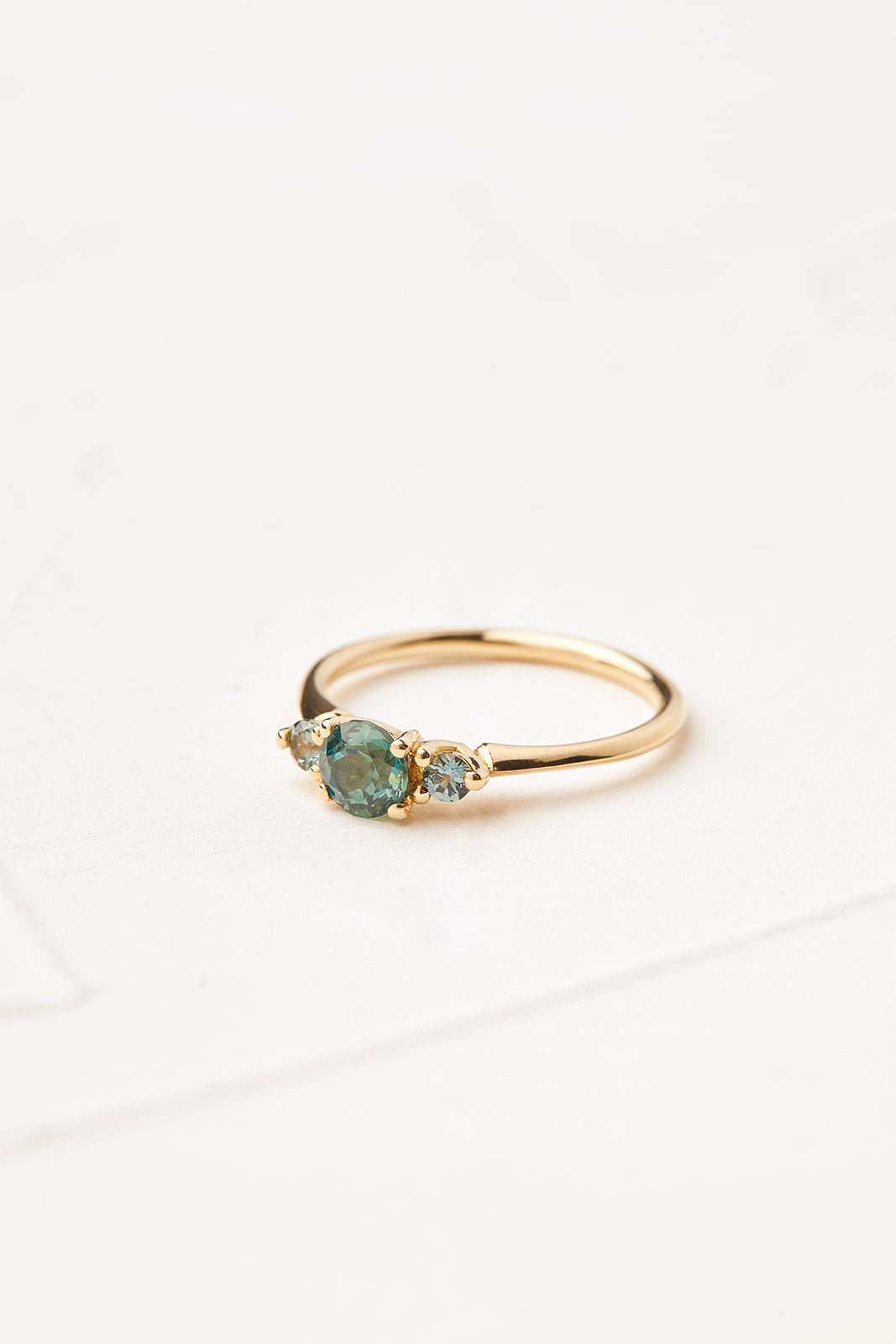 Radiant Anemone Ring (0.65ct Blue Sapphire center)