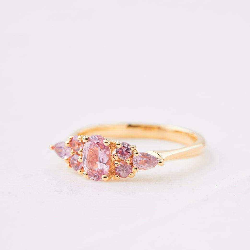Engagement ring with pink sapphire stones