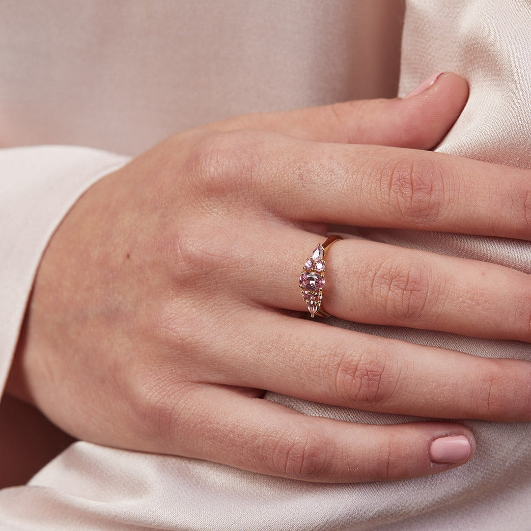Engagement ring with pink sapphire stones