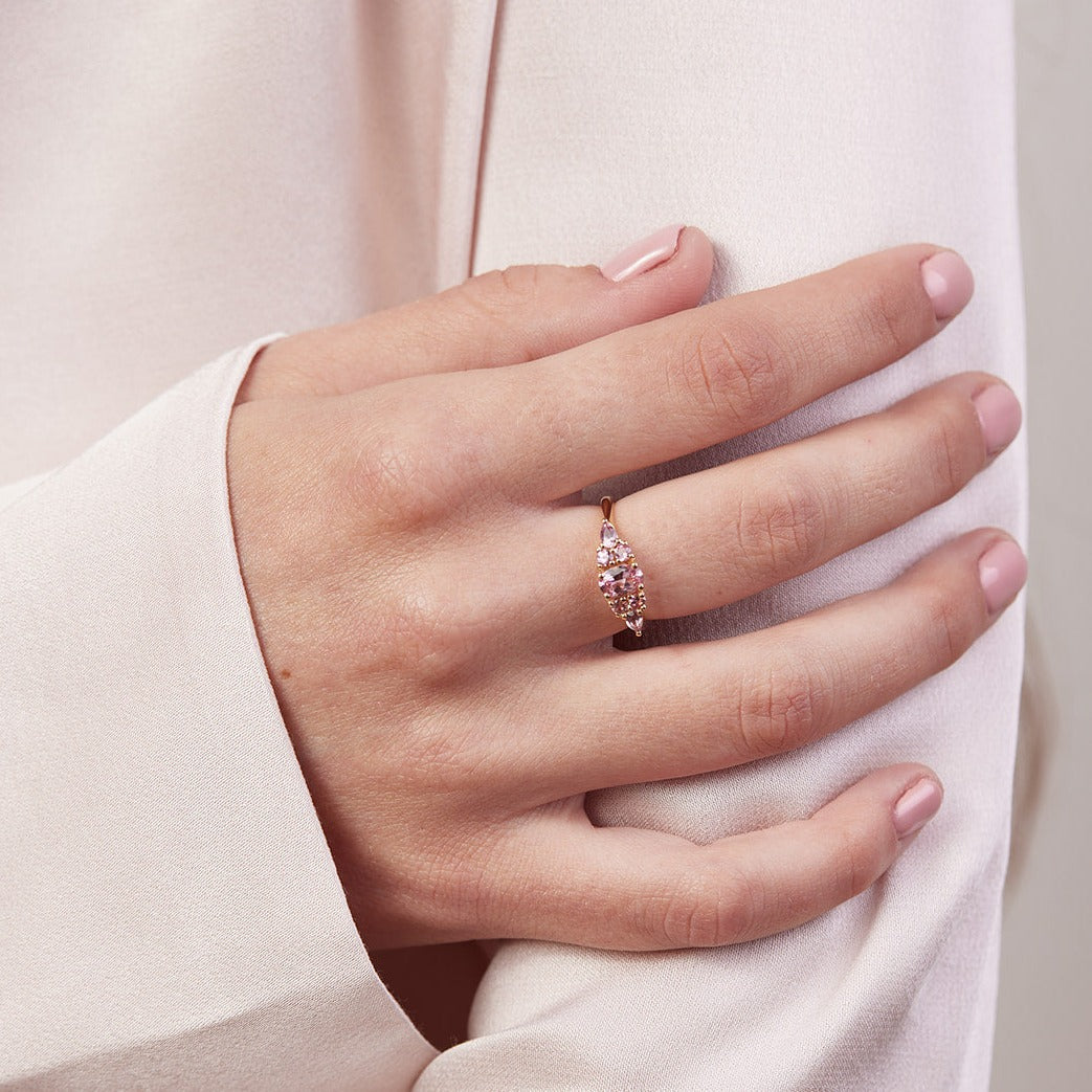 Engagement ring with pink sapphire stones