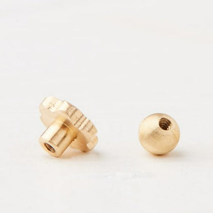 Piercing With a Drop Stone in a Gold Frame
