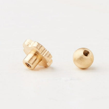 Piercing With an Oval Stone in a Gold Frame