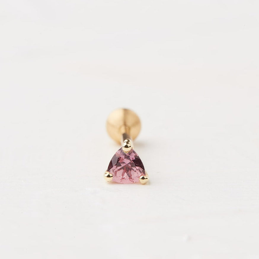 Piercing With A Triangular Stone