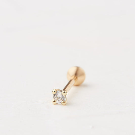 Square piercing with a round stone