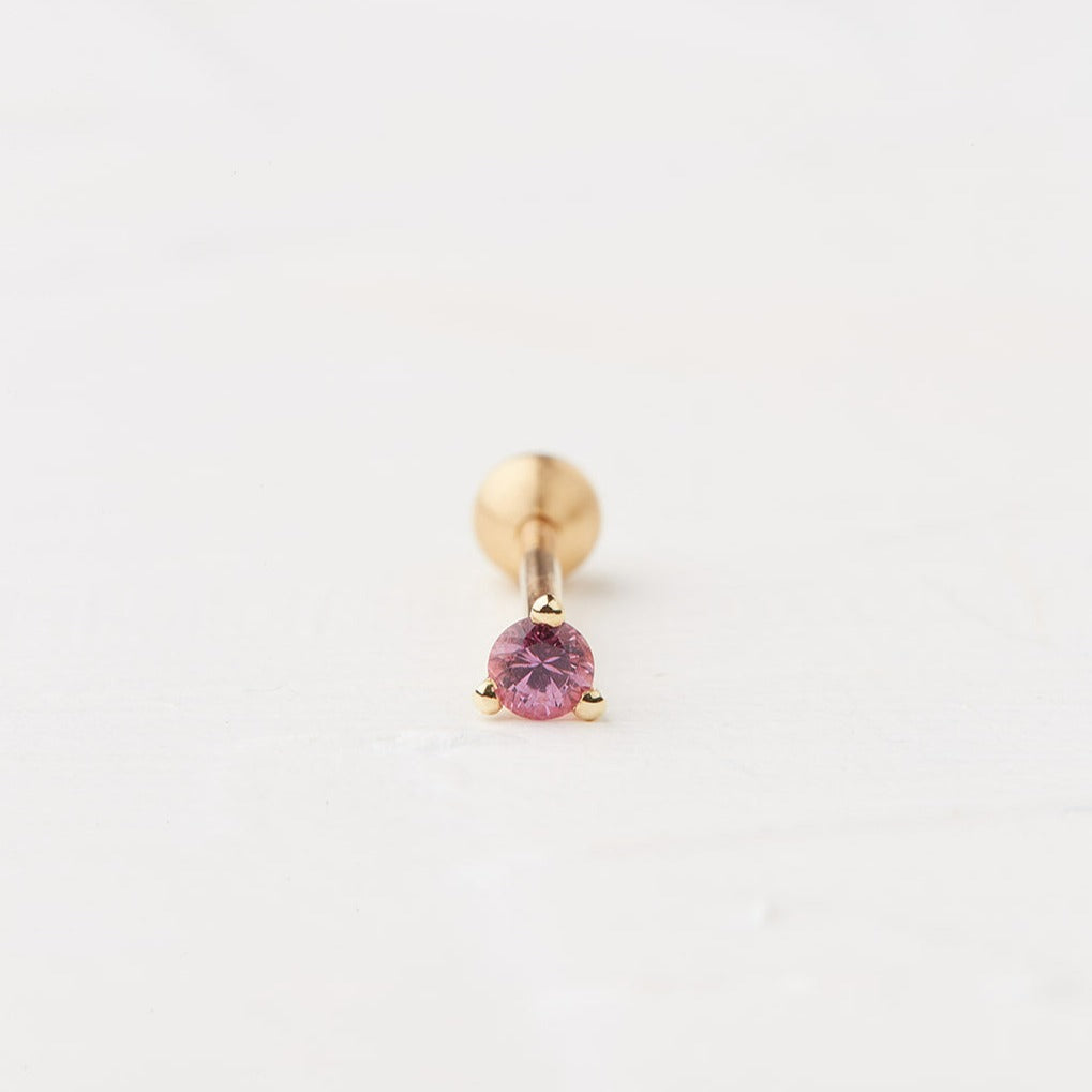 Triangle Piercing With a Round Stone