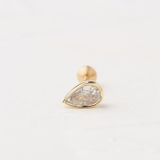 Piercing With a Drop Stone in a Gold Frame