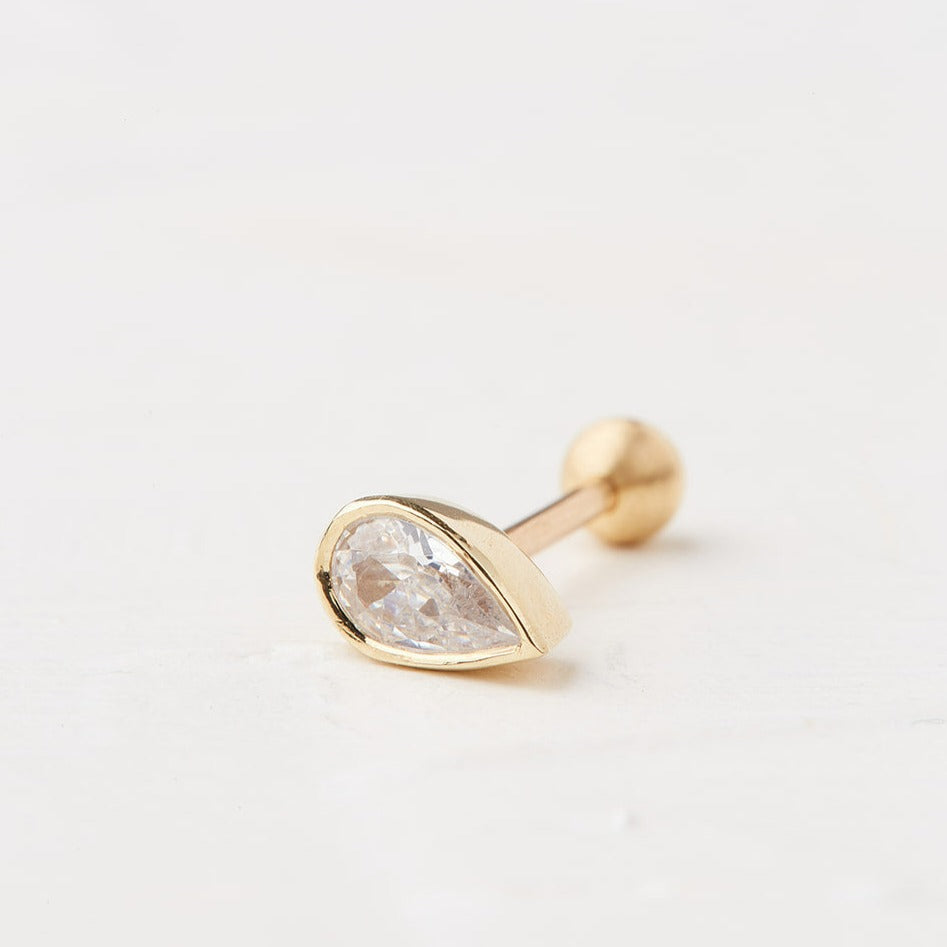 Piercing With a Drop Stone in a Gold Frame