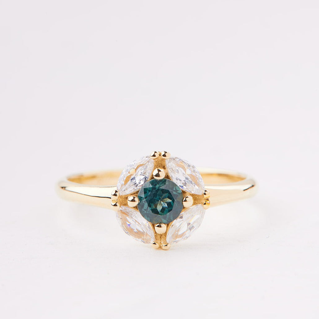 Magritte Ring set with turquoise sapphire and diamonds